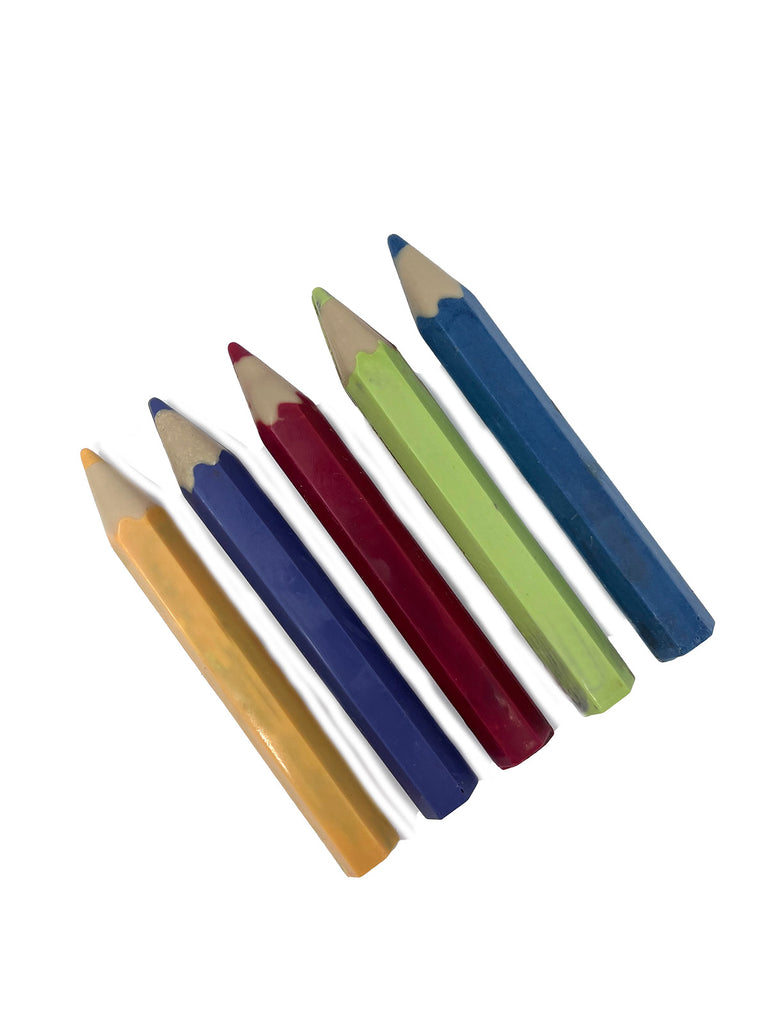 Set of 5 colourful chocolate pencils on a white background