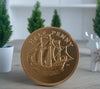 Milk chocolate coin in gold foil