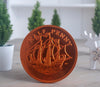 Milk chocolate coin in bronze foil
