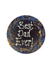 One round dark chocolate father's day plaque. Decorated with blue and orange splashes and piped Best Dad Ever! On a white background.