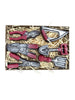 Gift box of miniature dark chocolate garden tools with red handles. On a white background. 