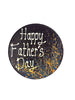 One round dark chocolate father's day plaque. Decorated with blue and orange splashes and piped Happy Father's Day. On a white background.