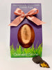 Handmade 70% dark chocolate Easter egg with honeycomb in a purple box with a pink ribbon, featuring the brand 'Gorvett & Stone.