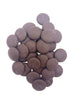 Pile of dark chocolate buttons on a white background.
