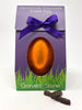 Handmade 70% dark chocolate orange Easter egg in a purple box with a purple ribbon, featuring the brand 'Gorvett & Stone'.