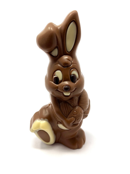Milk chocolate bunny figurine on a white background
