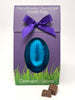 Handmade chocolate Easter egg in a purple box with a purple ribbon, featuring the brand 'Gorvett & Stone'.