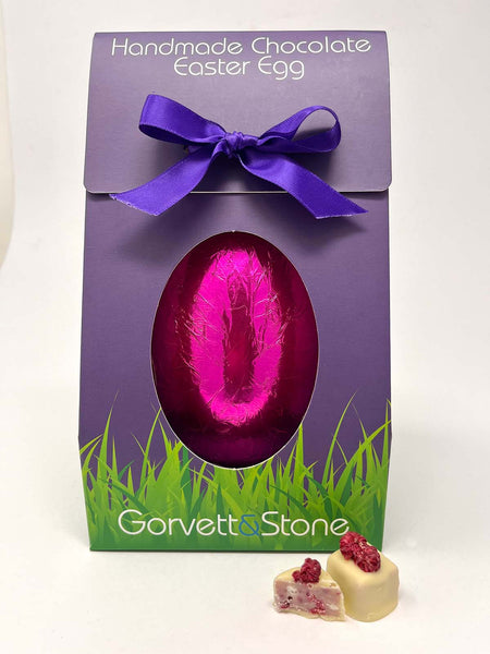 Raspberry and white chocolate Easter Egg in pink foil and packaged in a G&S Easter egg box.