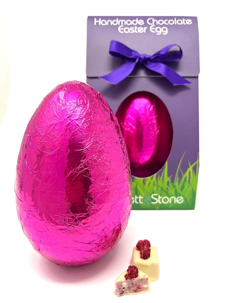 Raspberry and white chocolate Easter Egg in pink foil and packaged in a G&S Easter egg box.