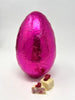 Raspberry and white chocolate Easter egg wrapped in bright pink foil.
