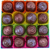 Open box of 16 dark chocolates in colourful cases.