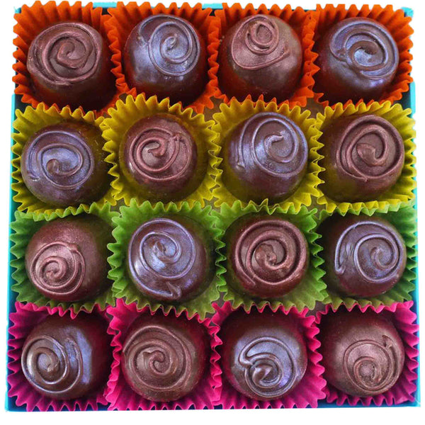 Open box of 16 dark chocolates in colourful cases.